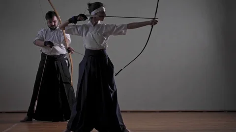 Couple practicing Kyudo bow shooting Stock Footage 74407136