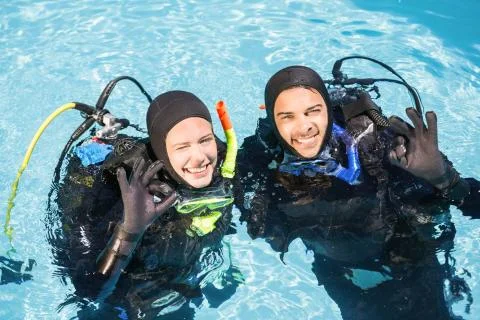 Couple practicing scuba diving together 스톡 사진