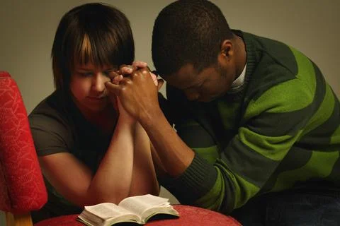 A Couple Praying Together Stock Photos
