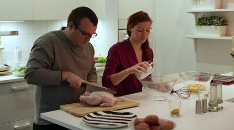 A couple preparing dinner Stock Footage 58636499