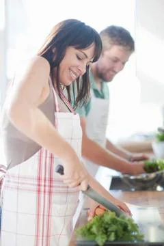 Couple preparing food Stock Photos