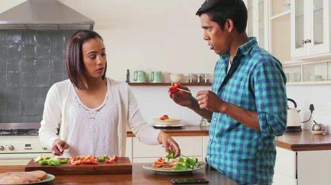 Couple preparing food together Video stock 58280970
