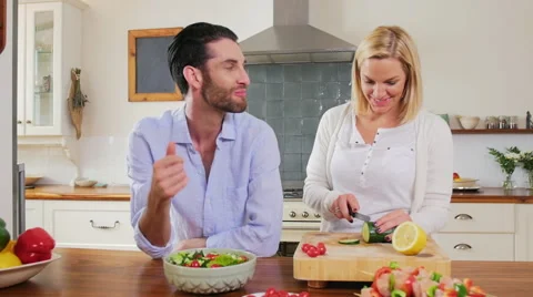 Couple preparing food together Video stock 58281107