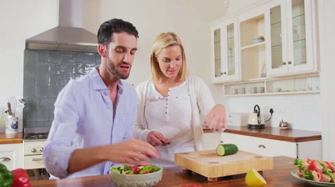 Couple preparing food together Video stock 58281113