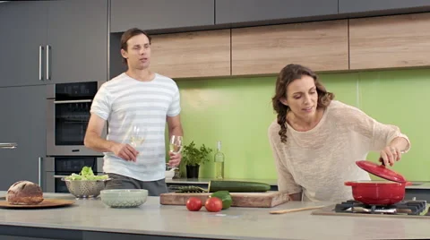 Couple preparing a meal together Stock Footage 60789088