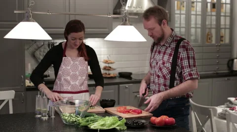 Couple preparing a salad Stock Footage 62795189