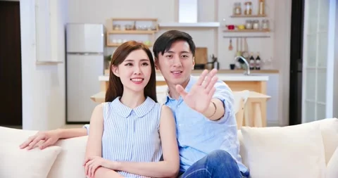 Couple press virtual screen button Stock Footage 137015680