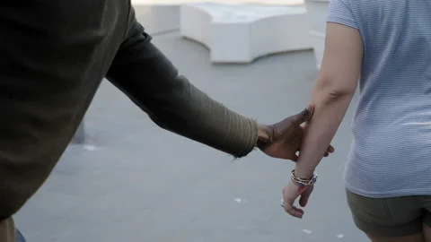 Couple problems - black man trying to talk to his girlfriend who refuses Stock Footage 133380062
