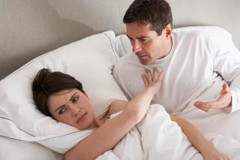 Couple With Problems Having Disagreement In Bed Stock Photos