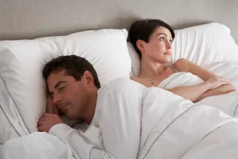 Couple With Problems Having Disagreement In Bed Stock Photos