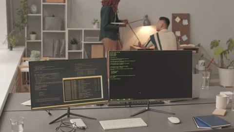 Couple of Programmers Working Together in Office Stock Footage 195977905