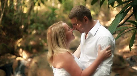 Couple in rain forest Stock Footage 38297064