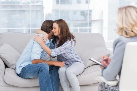 Couple reaching break through in therapy session Stock Photos