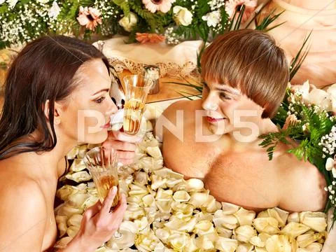 Couple relax at spa with flower. Stock Photos