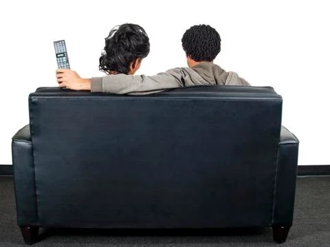 Couple relaxing on a couch Foto stock