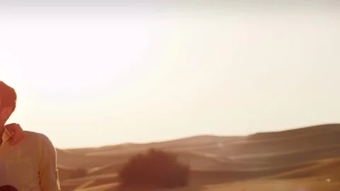 Couple relaxing on desert. Stock Footage 119390138