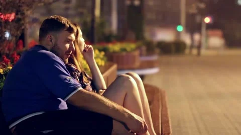 Couple relaxing in the park Stock-Footage 65454899