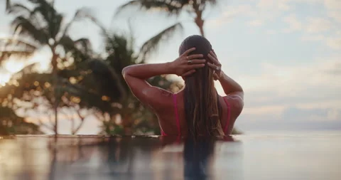 Couple Relaxing in the Pool on Vacation Stock Footage 226044567