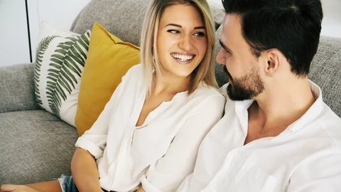 Couple relaxing on sofa. Stock Footage 101890404