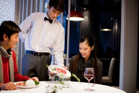 A couple at a restaurant Stock Photos