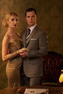 Couple in retro interior. Stock Photos