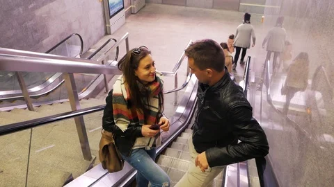 A couple of rides on the escalators Stock Footage 88857705