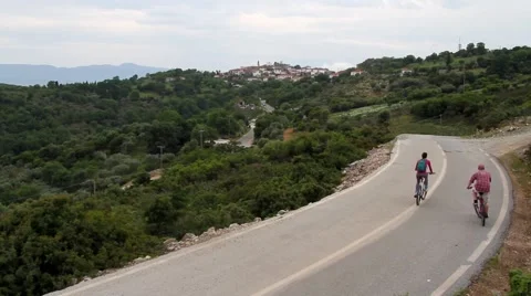 Couple riding mountain bikes Stock Footage 40353247