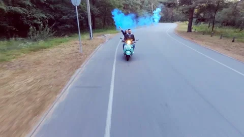 Couple riding a scooter. Stock Footage 97320172