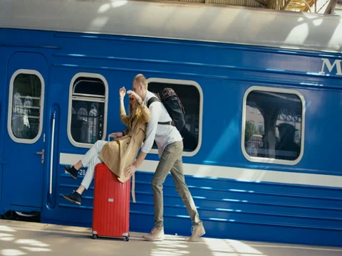 Couple Riding On Suitcases Video stock 78773119