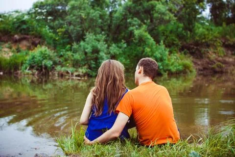 Couple by the river Fotos Stock