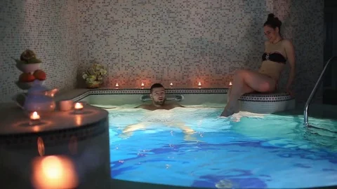 A couple on romantic date in the spa sauna Stock Footage 73673735