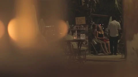 Couple in Romantic Setting Talking to Waiter. Stock-Footage 62176219