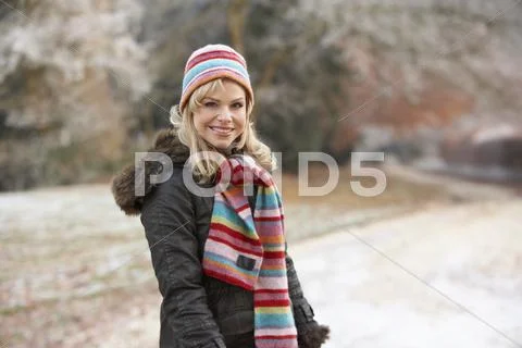 Couple On Romantic Winter Walk Through Frosty Landscape Stock Photos