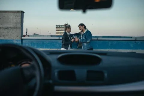 Couple at the rooftop date Stock Photos