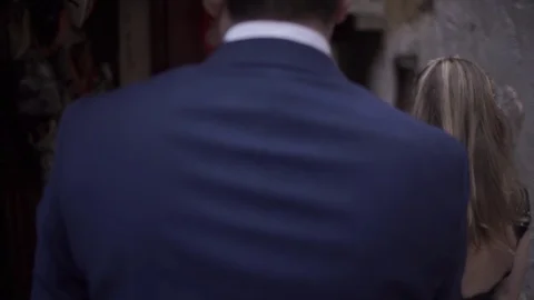 Couple runners in the middle Small Back Street Between Buildings at Morocco Stock Footage 106424135