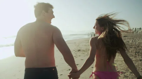 Couple Running on Beach Stock-Footage 39943621