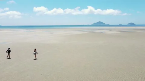 A couple is running on the beach Stock Footage 156467795