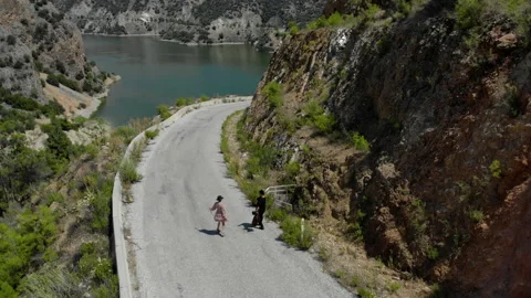 Couple running by the dam Stock Footage 229166725