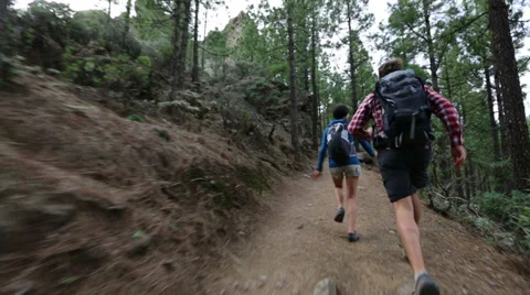 Couple running having fun while hiking Video stock 37680122