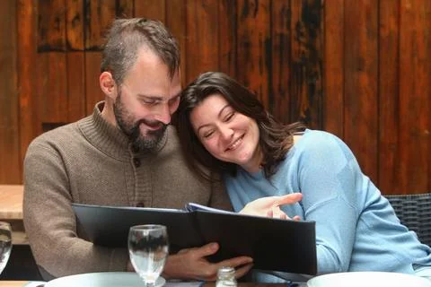 Couple in rustic restaurant  Stock Photos