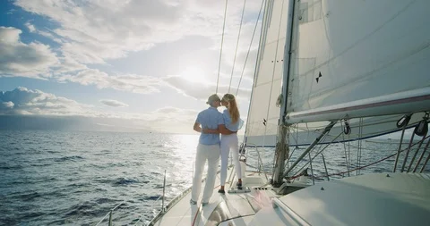 Couple Sailing into the Sunset Stock Footage 91735754
