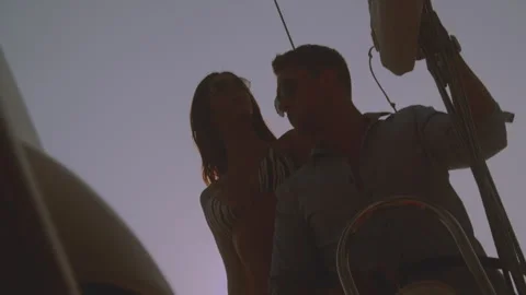 Couple sailing with the sunset 스톡 동영상 247515096