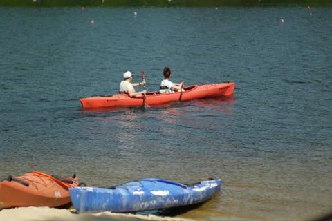 Couple sails kayaking  Stock Photos