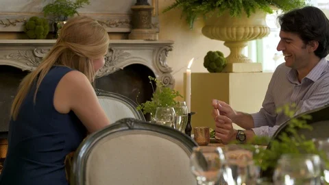 Couple sat in restaurant face to face. Stock-Footage 88176643