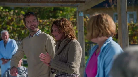 Couple says goodbye to the grope of elderly citizen Stock Footage 46876352