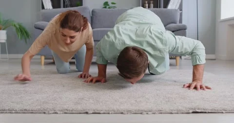 Couple searching lost item on carpet Stock Footage 314780183
