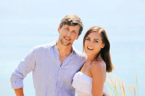 Couple at seaside Stock Photos