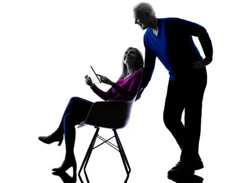 Couple senior digital tablet computer silhouette Stock Photos