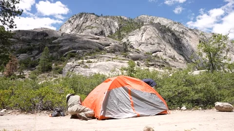 Couple setiing up a Tent Stock Footage 242025022