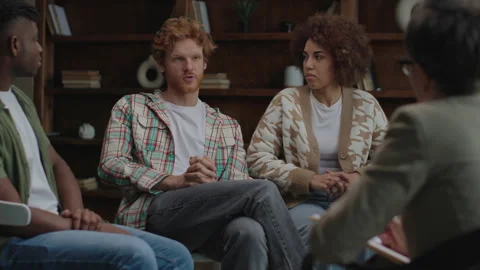 Couple Sharing Concerns in Group Therapy, Seeking Support and Understanding Stock Footage 309531319